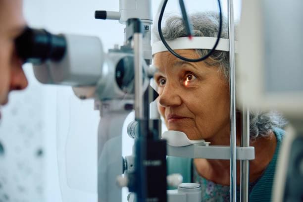 Senior woman having an eye exam at ophthalmologist's office. Elderly woman having her eyesight checked at ophthalmology clinic. having an eye exam stock pictures, royalty-free photos & images